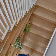 Wooden staircase pictured from above in Melbourne house
