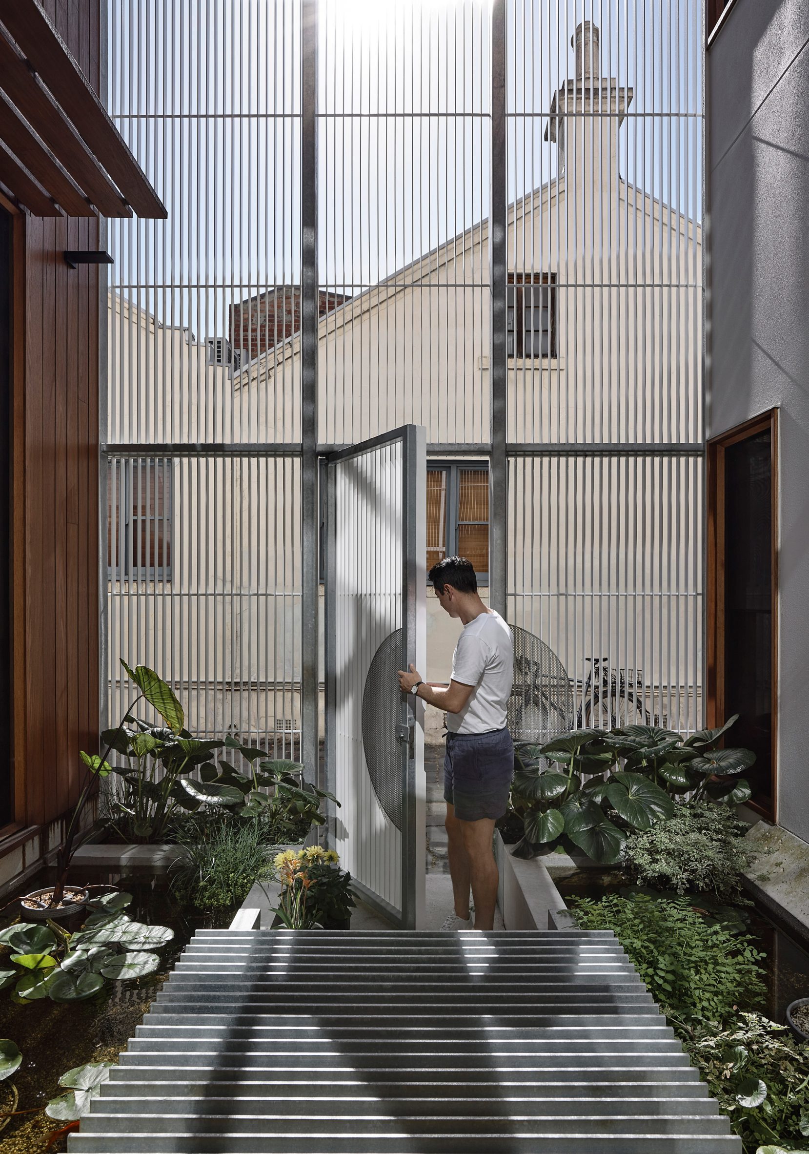 Entry space with pond in Austin Maynard Architects project Melbourne