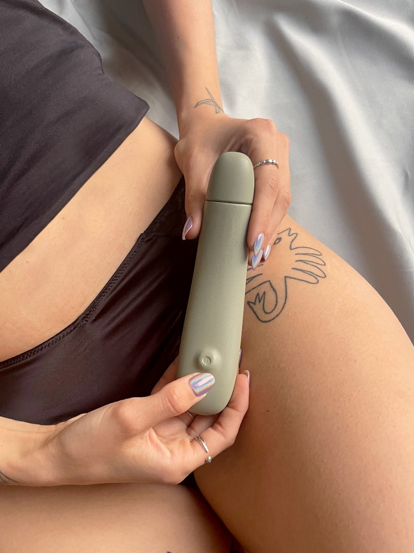 Close-up of person holding vibrator for artificial insemination