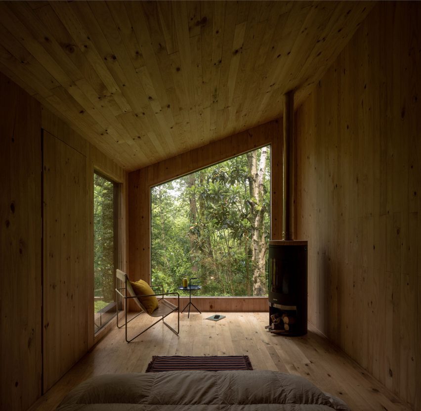 Wood-lined interior of Aralar Cottage by BABELStudio