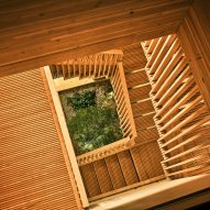 A planting bed at the bottom of a wooden staircase