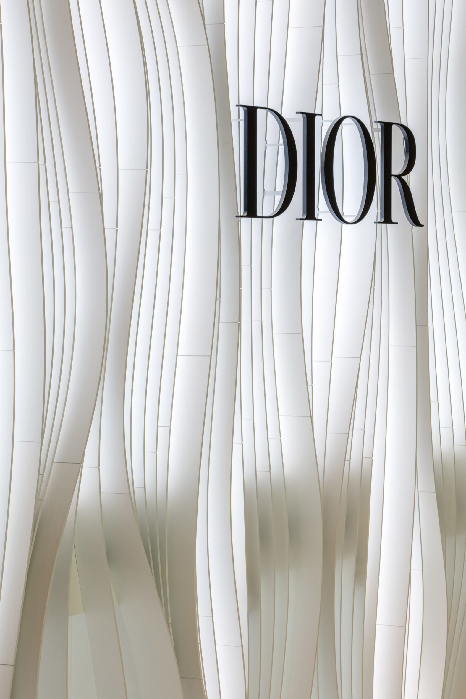 Dior logo on a backlight facade