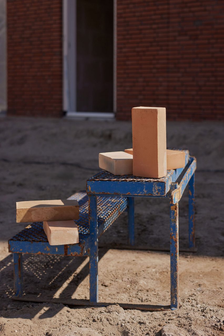Photo of bricks stacked on equipment on a building site