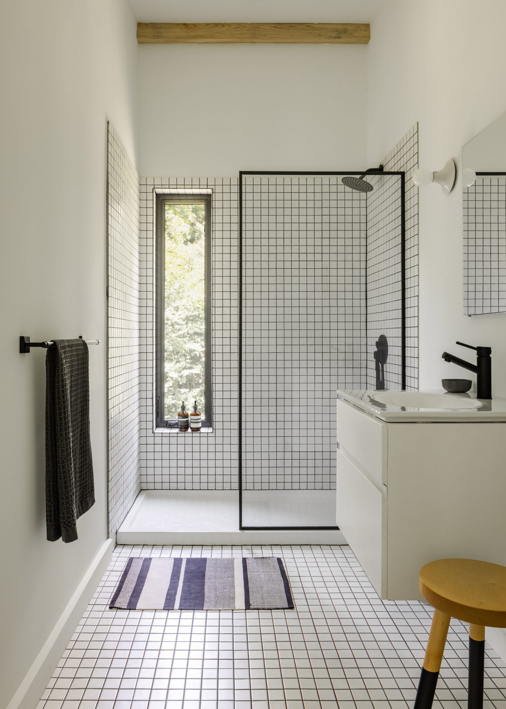 A bathroom with white tile