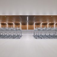 Interior view of IJboulevard bike parking facility by VenhoevenCS Architecture + Urbanism