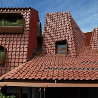Angular red-tiled roof of Distracted House by Ismail Solehudin Architecture