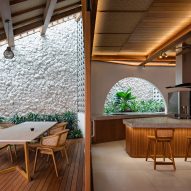 Kitchen with a covered outdoor dining terrace