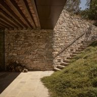 Stone steps leading to the Liknon building by K-studio