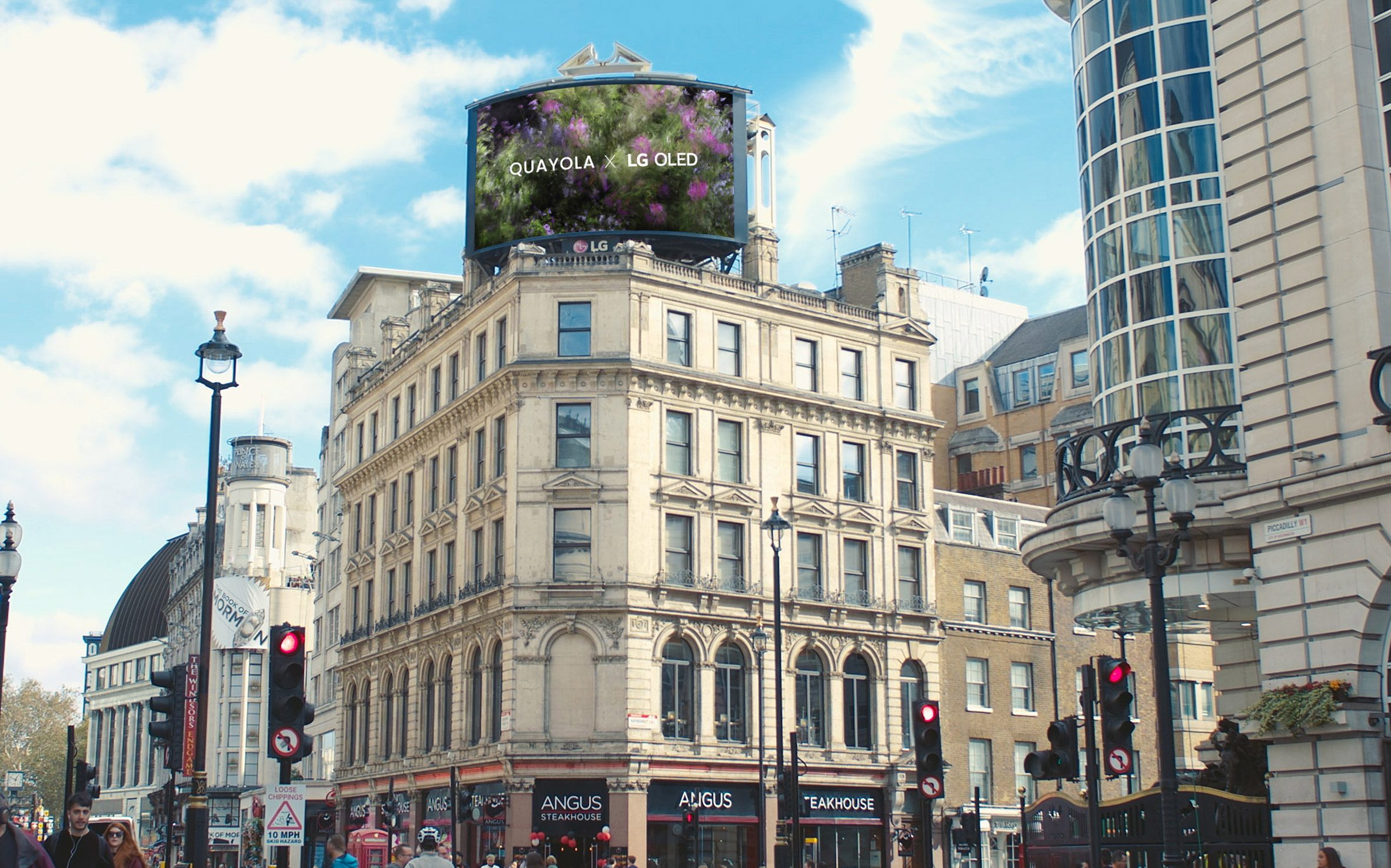 Photo of a billboard ad above a building on Picadilly Circus showing one of the artworks with the text "LG x Quayola" overlaid