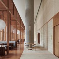 Hotel lounge interior with wood-clad surfaces