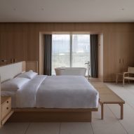 Wood-lined hotel bedroom