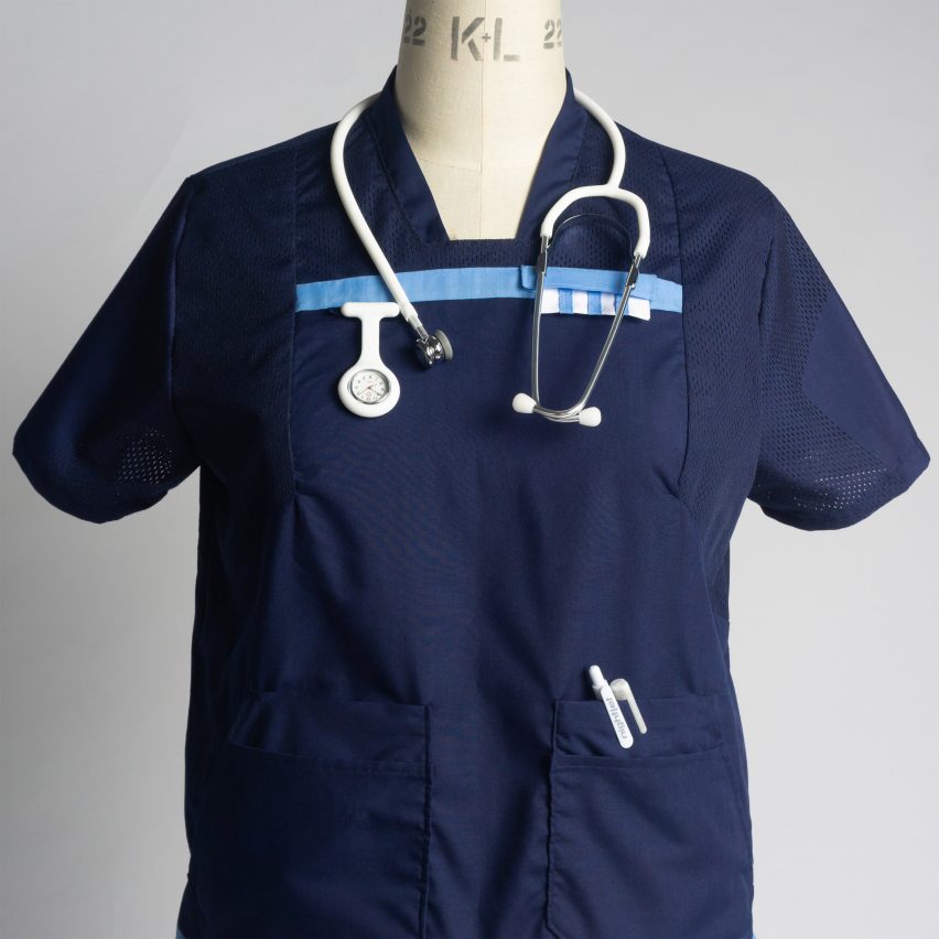 Photograph showing navy blue nurses uniform on mannequin