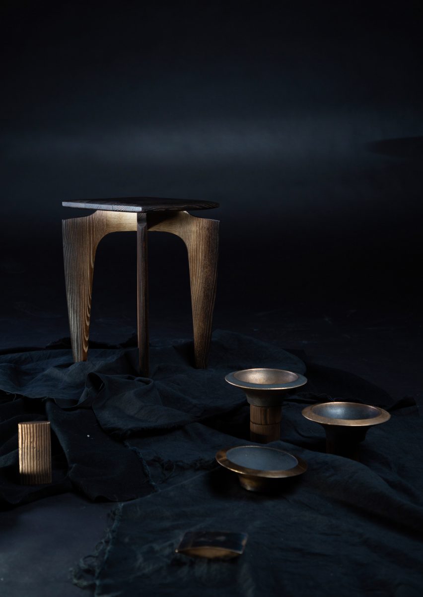 Table and bowls on dark backdrop