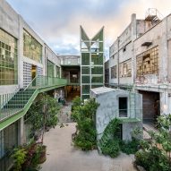 Productora converts Mexico City textile factory into green-trimmed artist studios