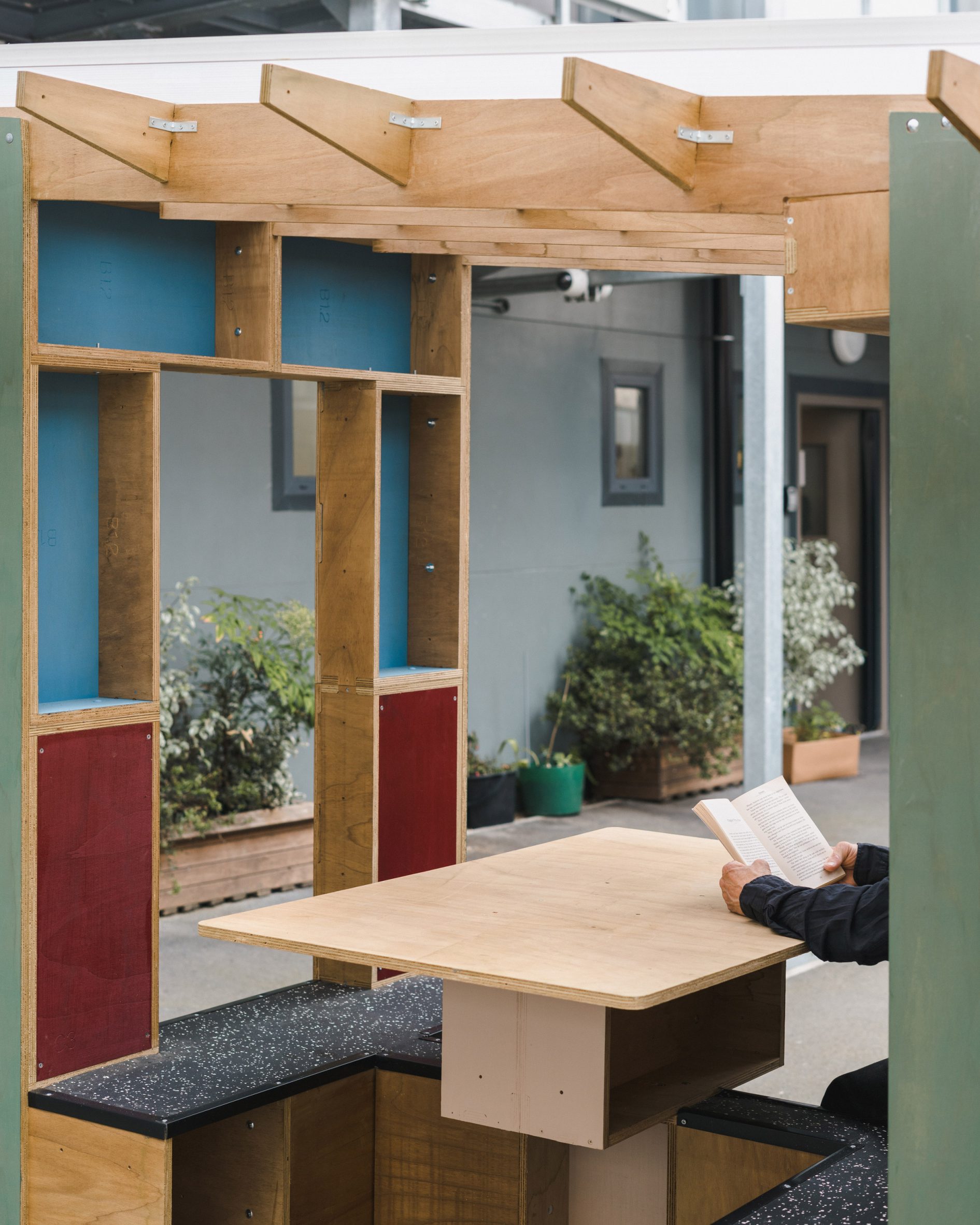 Modular plywood structure with table and seating