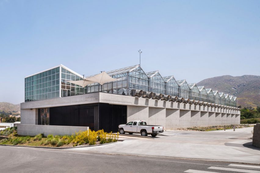Greenhouses on second floor of facility in California with a truck