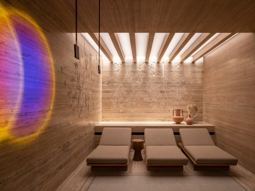 Travertine lines the walls and ceiling inside the spa and Roman baths in Six Senses Rome hotel by Patricia Urquiola