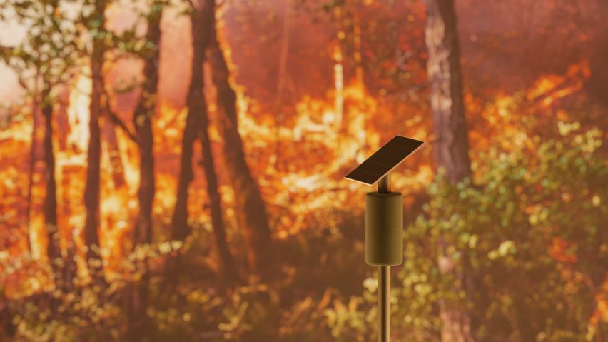 Solar Lookout wildfire detection system situated in a forest on fire