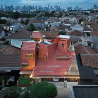 Angular clay-tile roof crowns Jakarta home by Ismail Solehudin Architecture