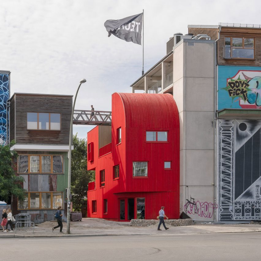 Red timber Haus 2+ office building by Office ParkScheerbarth