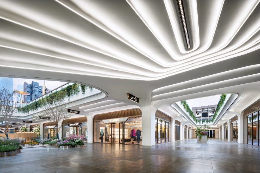Shopping district with illuminated white ceiling