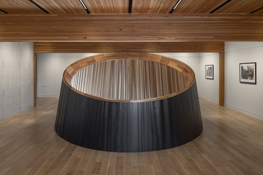 A large black wooden oculus