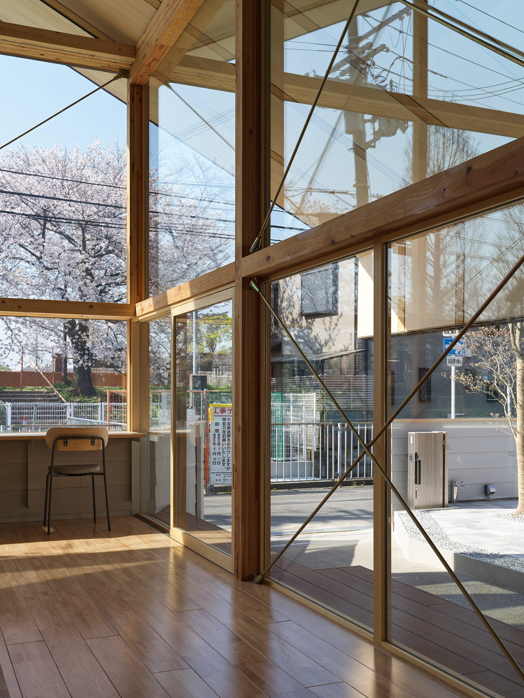 Yukawa Design Lab arranges children's library around giant wooden 