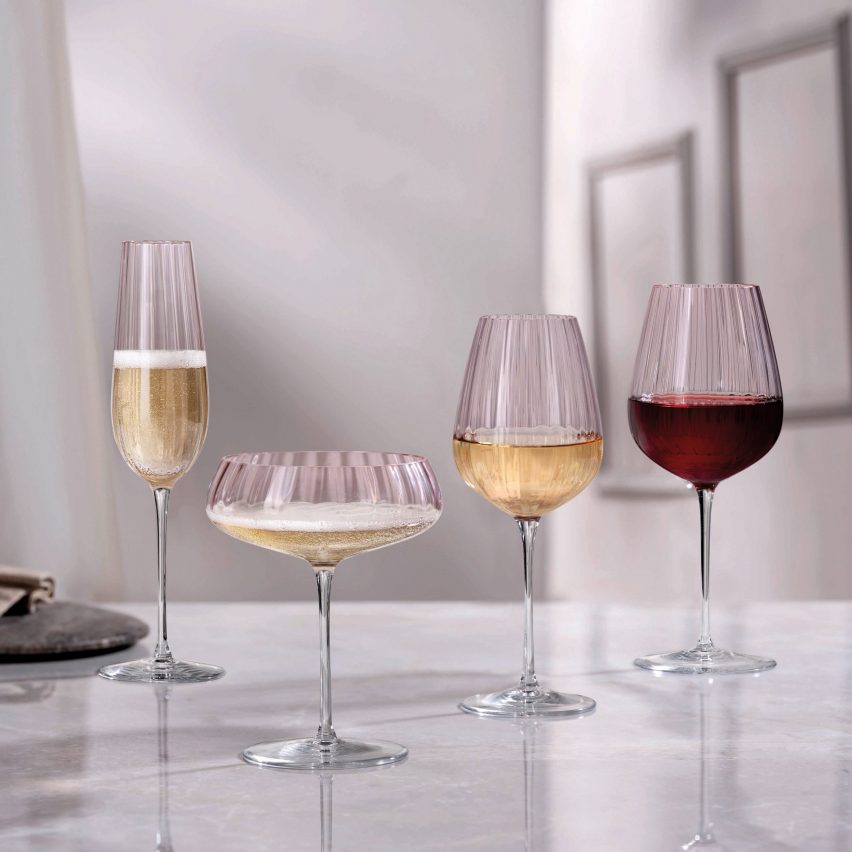 Four wine glasses in dusty rose