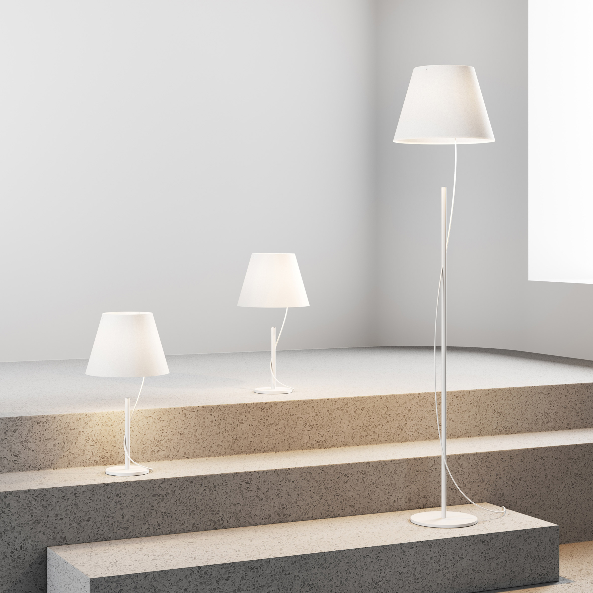 Three hover lamps displayed on stairs