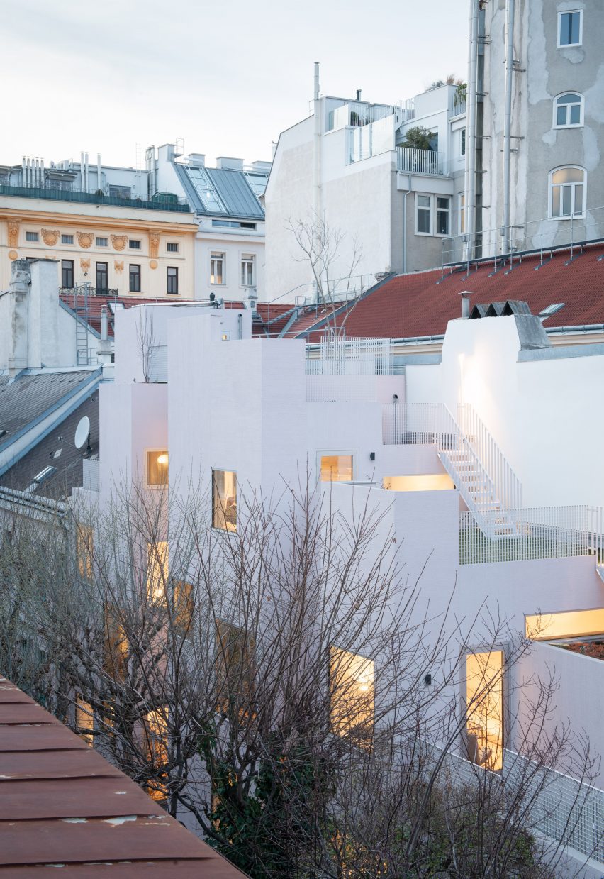 View of PSLA Architekten's urban townhouse in Vienna showing cascading terraces