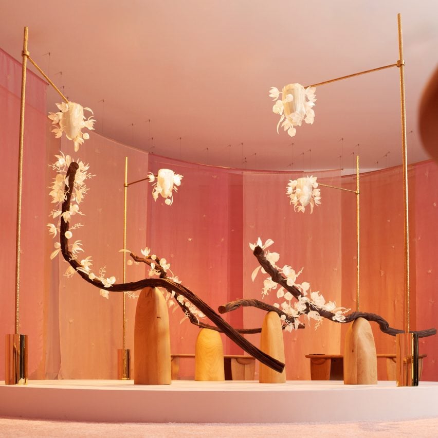 Floral art installation with long branches called The Pollination Dance