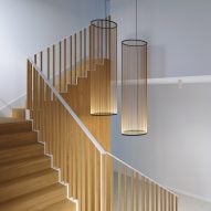 Array lighting by Umuc Yamac for Vibia in a cylinder shape