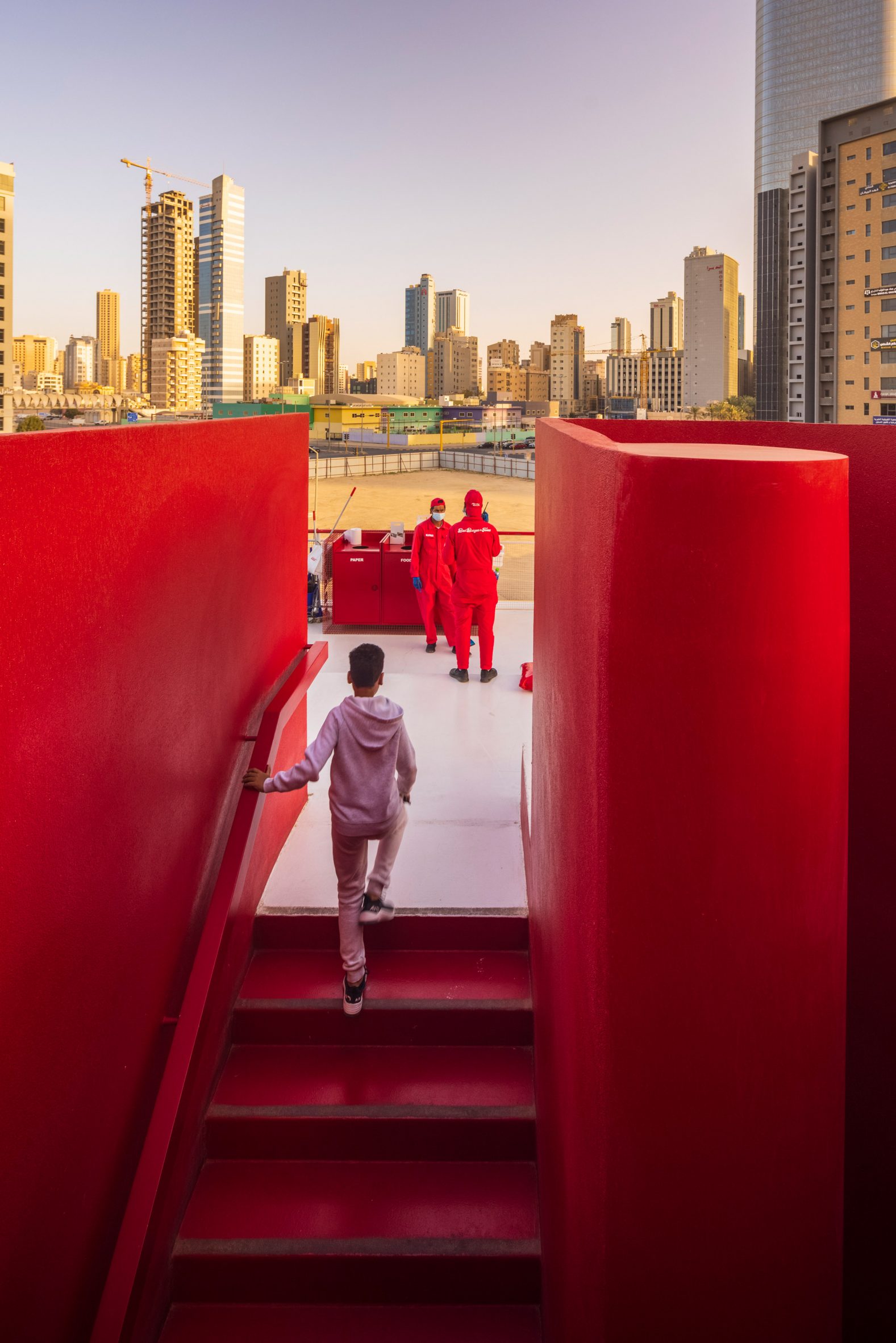 Red staircase to roof of BBT Hilltop restaurant in Kuwait City by TAEP/AAP