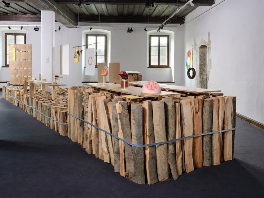 Bundles of firewood used as exhibition display podiums