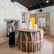 Medprostor stacks firewood for Ljubljana design biennial exhibition