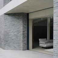 Brick exterior wall and full-height window at Camden Workshop by McLaren Excell