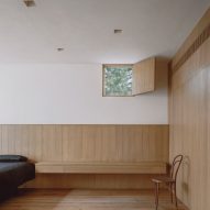 Bedroom with wood panelling