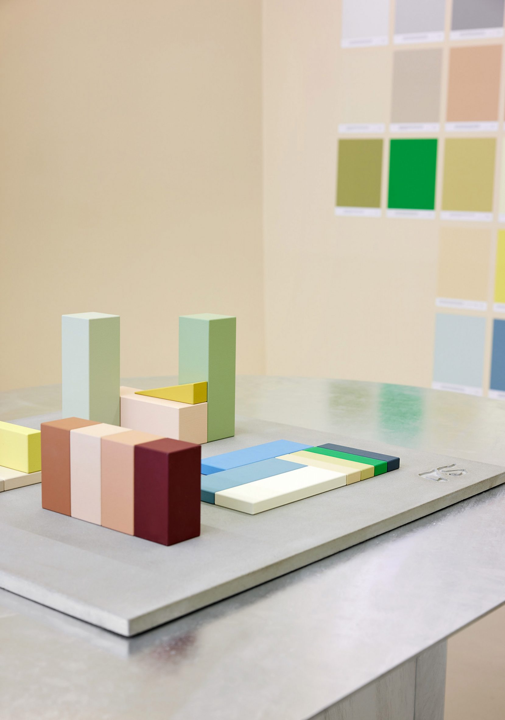 Colourful blocks on a silvery table