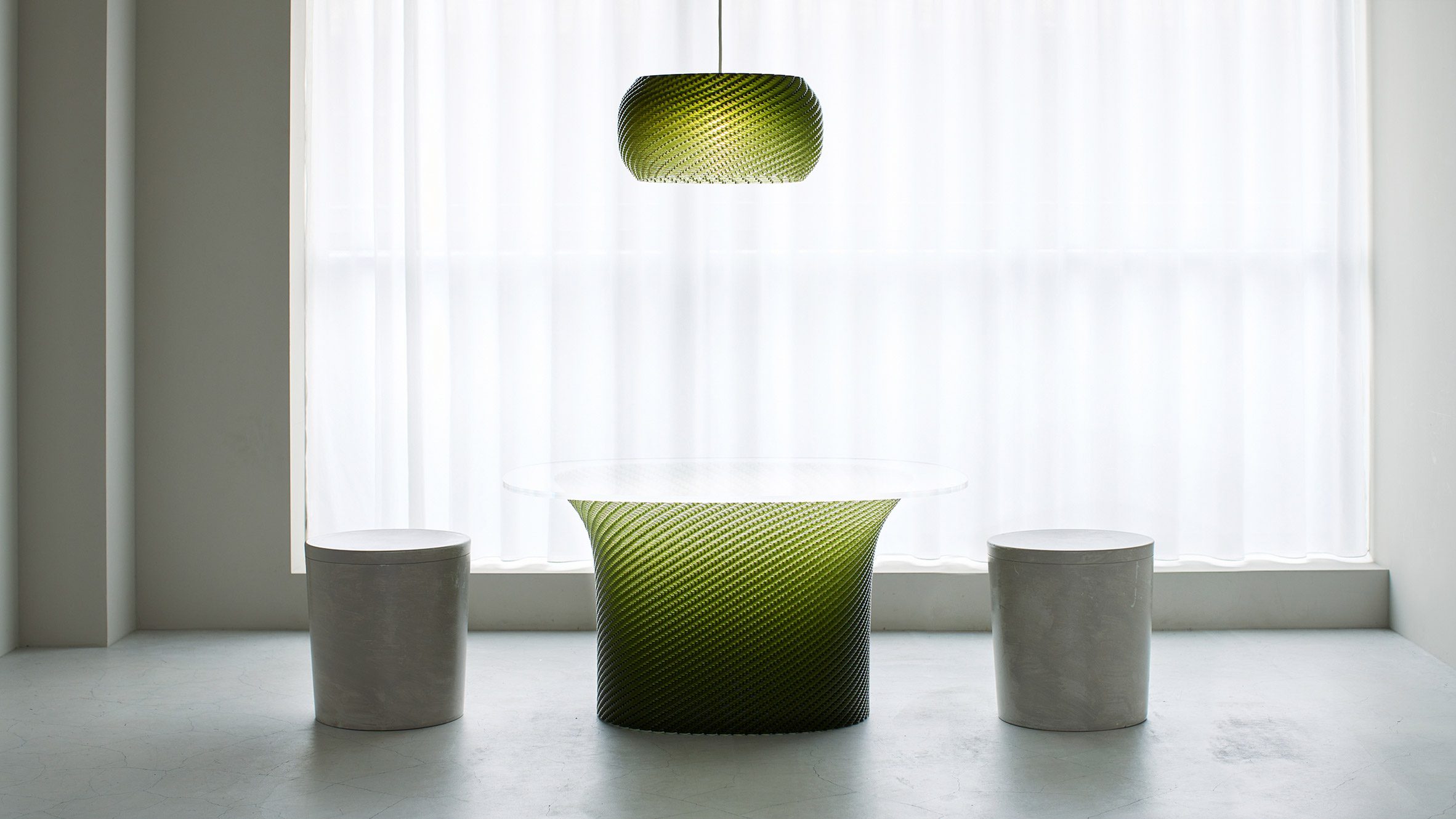 Green table and pendant lampshade at Designart Tokyo