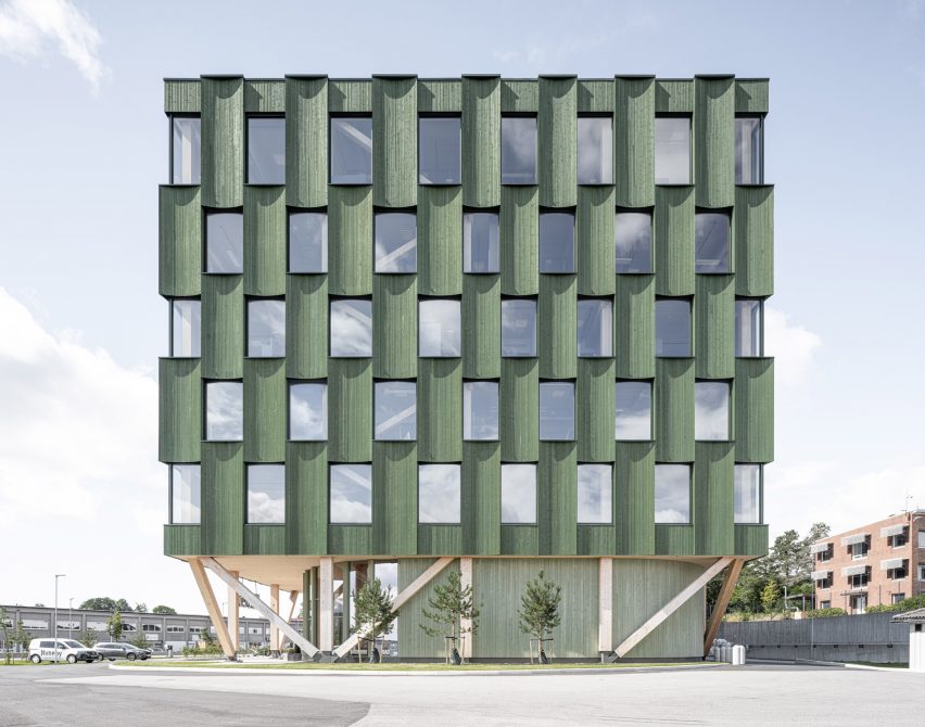 Facade of green timber clad office in Norway by Oslotre