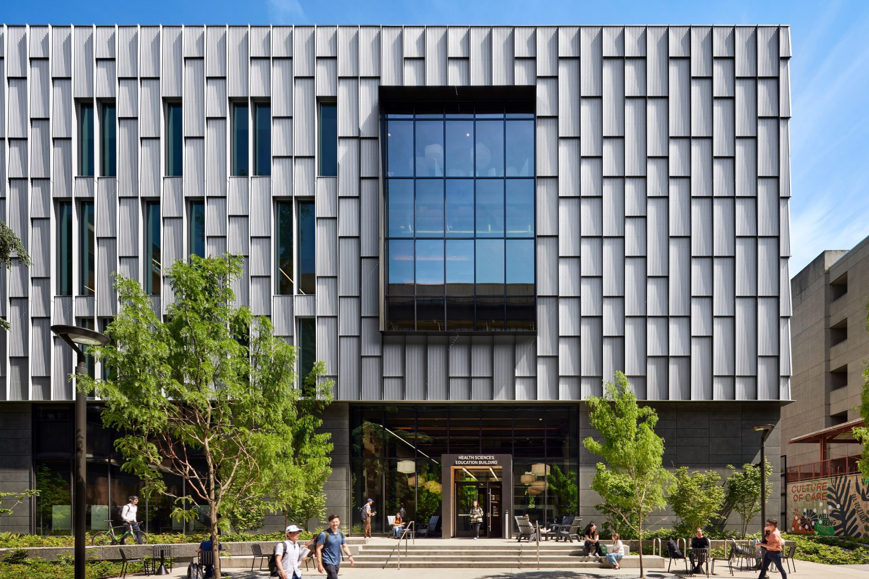 Textural metal skin wraps University of Washington building by Miller ...