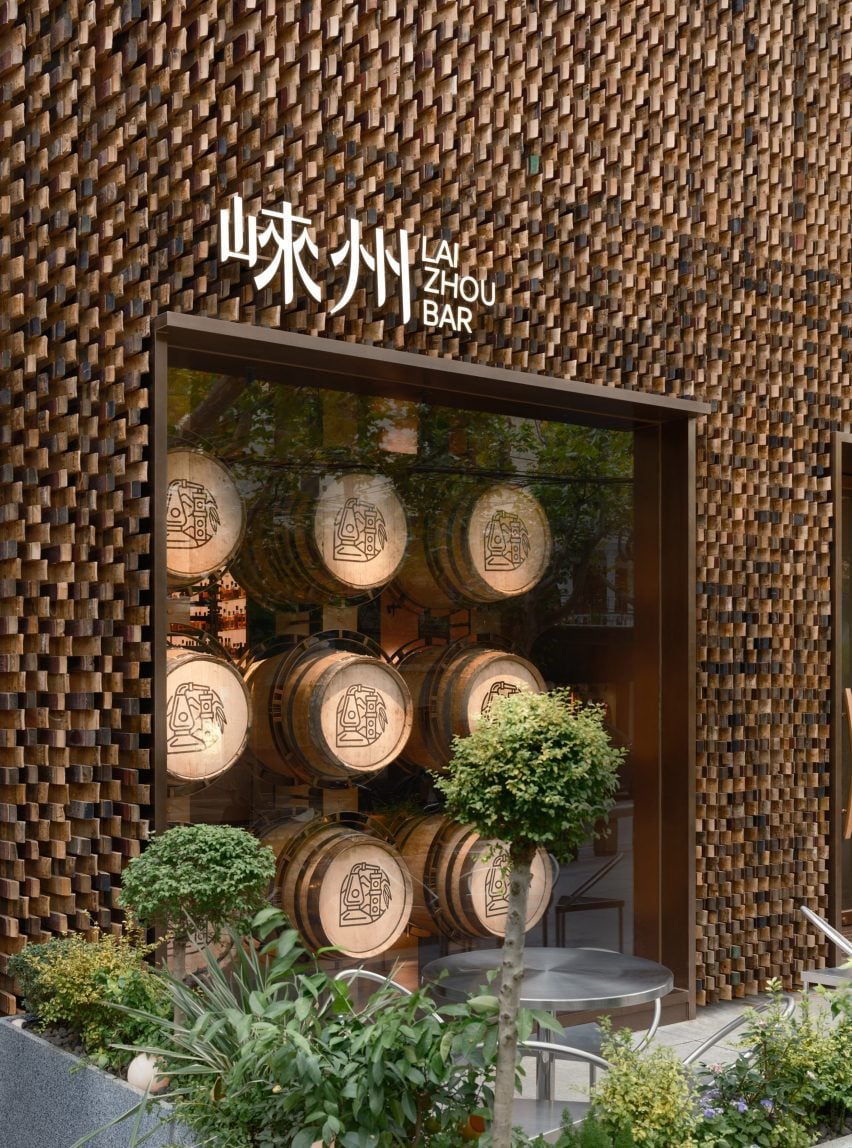 Exterior of Lai Zhou Bar by RooMoo features offcuts from wooden whiskey barrels