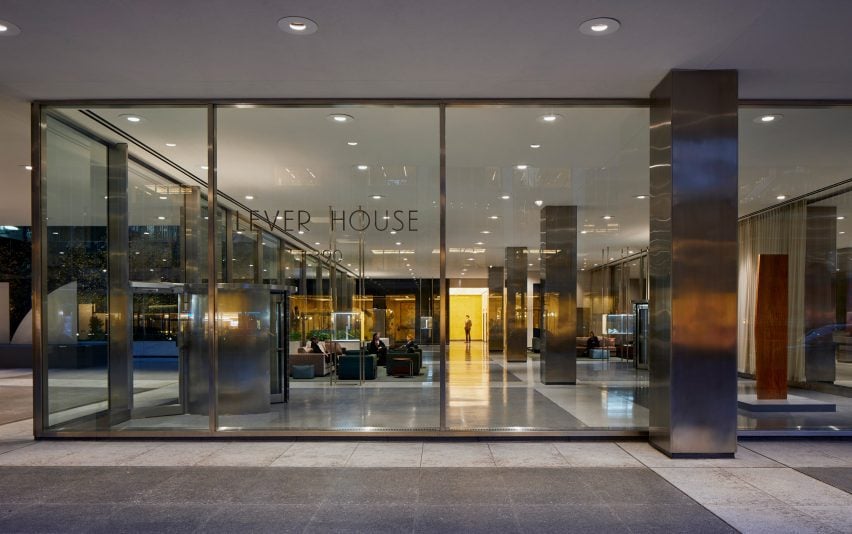 Large floor to ceiling glass surrounding a lobby