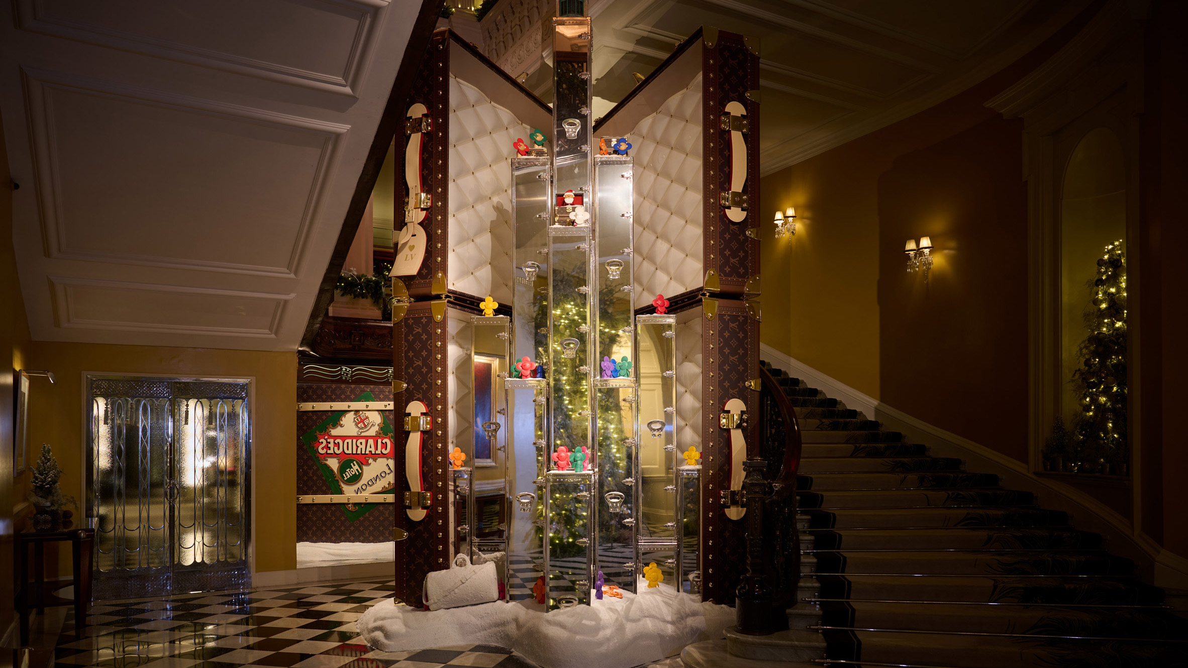 Louis Vuitton stacks travel trunks for Claridge's Christmas tree