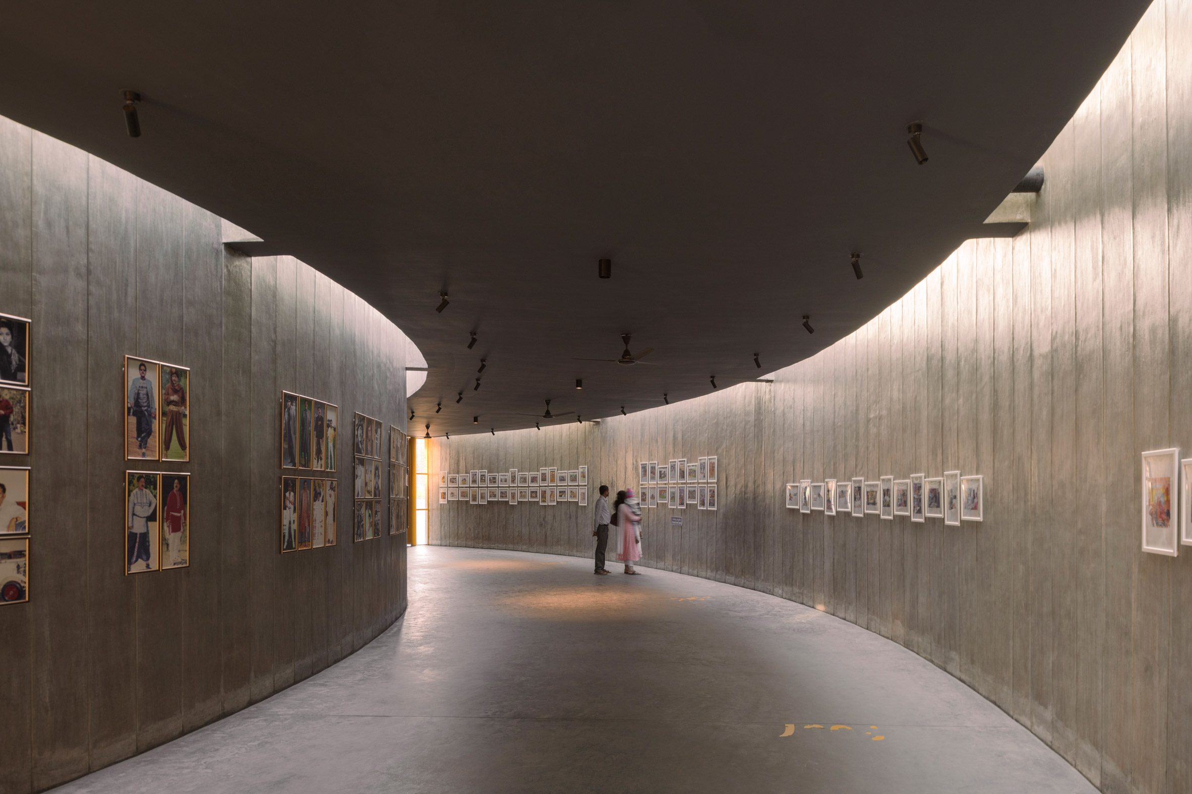Concrete photo gallery within memorial complex