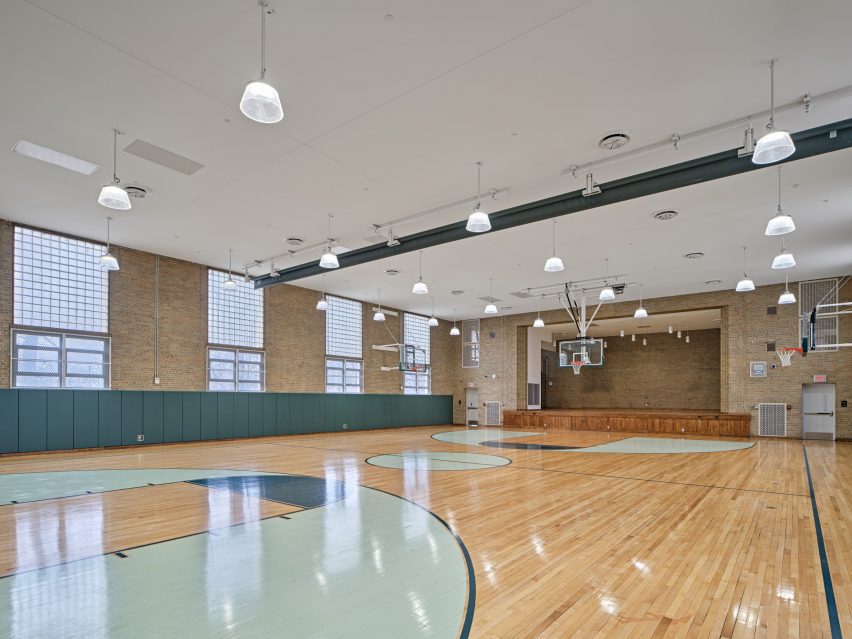 Basketball court with exposed brick walls