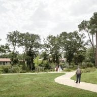 Garden path leading to the Alzheimer's Village in France by NORD Architects