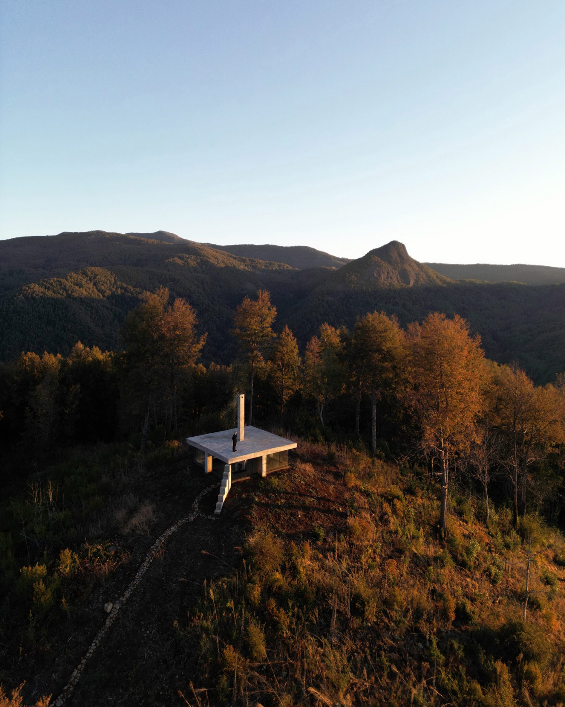 Rosa hilltop shelter is a is a Pezo von Ellrichshausen pavilion in Chilean landscape