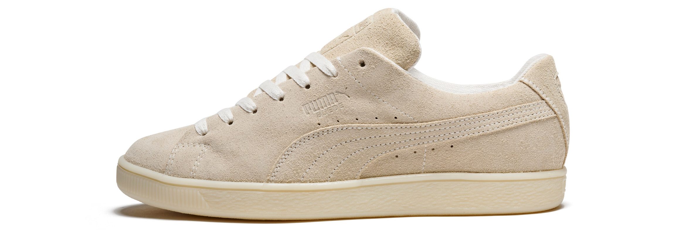 Photo of Puma's Re:Suede biodegradable sneaker showing a cream-coloured version of the common Suede sneaker