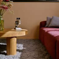 Plum coloured sofa in Kvadrat textiles